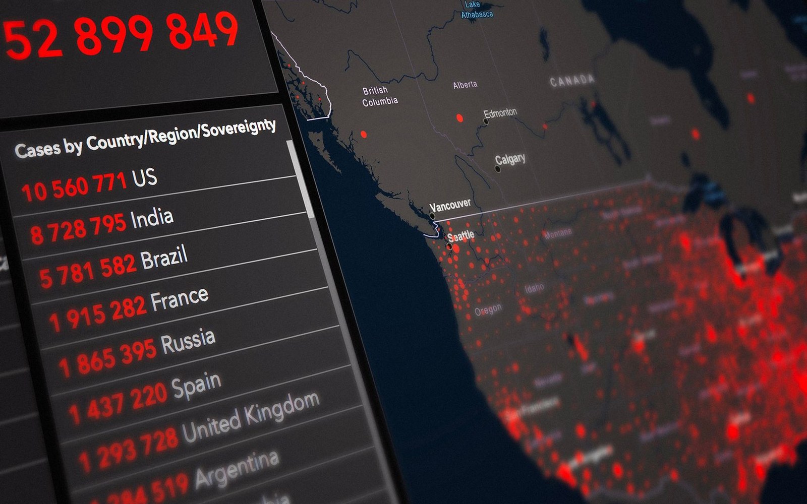 Global map dashboard showing red case density clusters with country rankings listed alongside